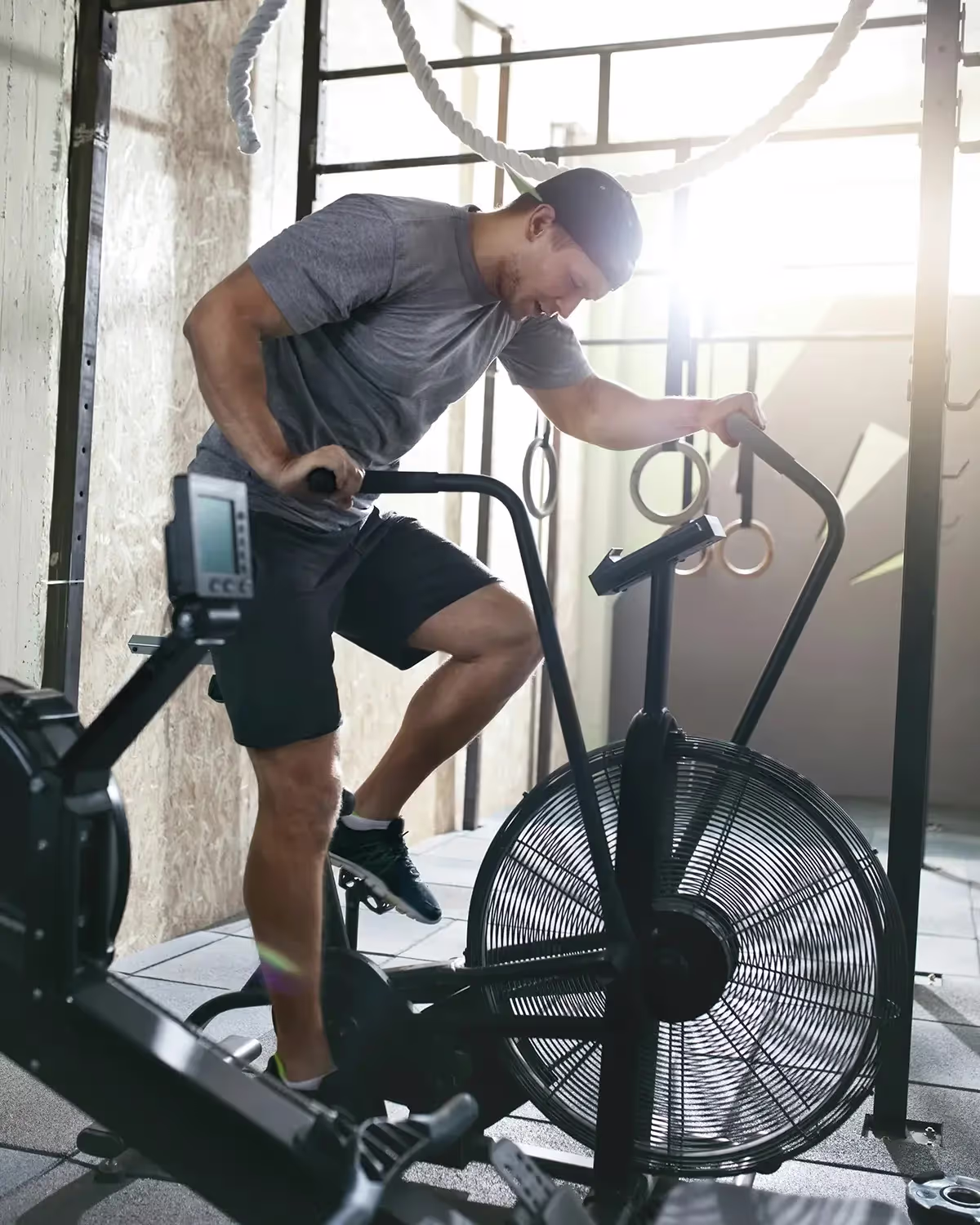 A man using an exercise bike