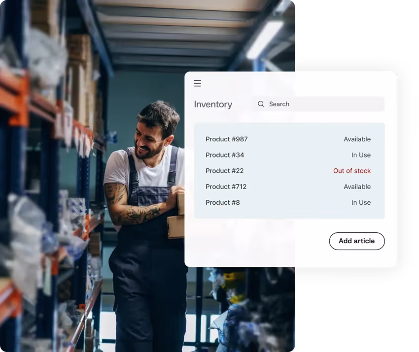 Man smiling in a storage room with a mockup of inventory with products with varying availabilities